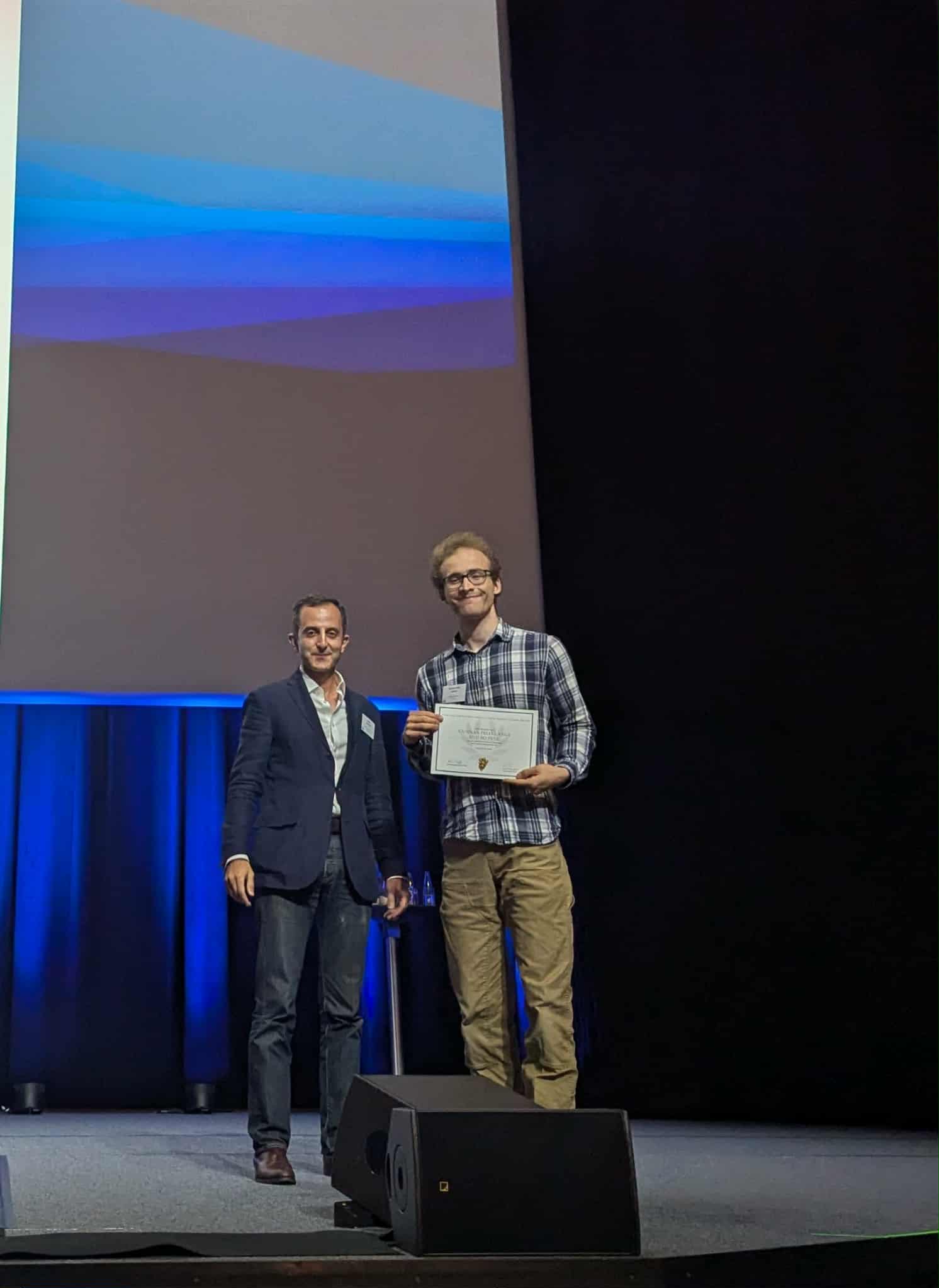 Gunnar Felix Lange receiving the award in Lausanne.