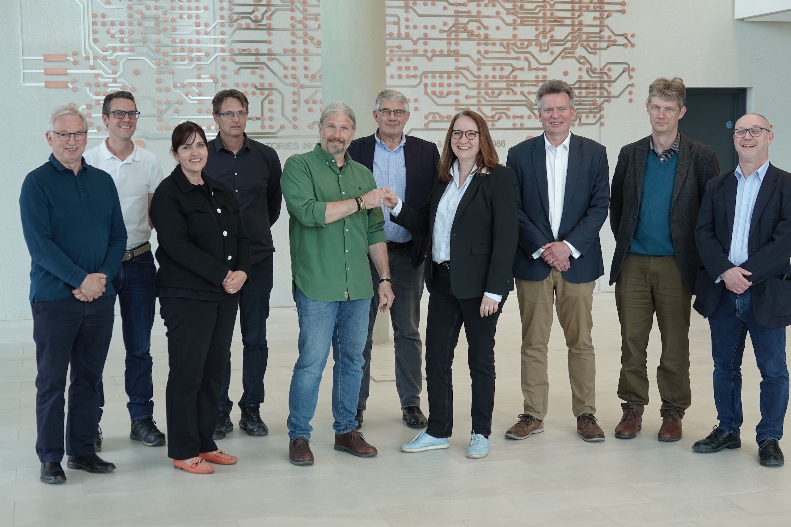 Handover: (L-R) Peter Norman (RDC Project Team), Sam Stokes (RDC Project Lead), Mete Atatüre (Head of the Cavendish Laboratory), Marie Chuet (Bouygues UK), Matt Allen (Estates Division) and David Hunt (RDC Project Team).